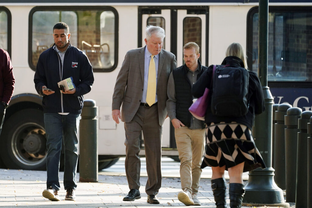 Johnny Doc walking into the courhouse