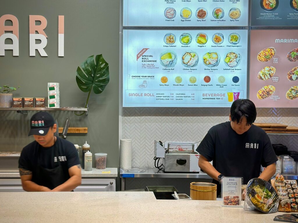 marimari-fusionsushi-02-scaled Proprietor Youngnam Kwon (right) and staff at Mari Mari in Center City, which he opened three years after launching a stand in H Mart following decades training in restaurants in Korea and NYC.