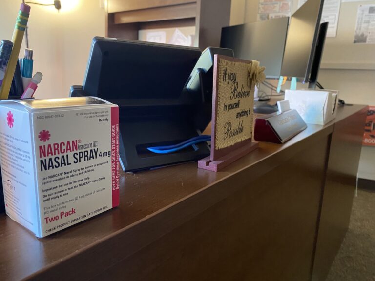 box of narcan on a desk