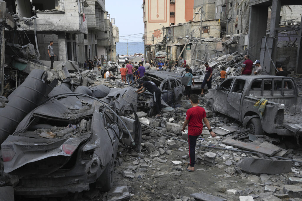 Palestinians Israel Palestinians inspect the rubble of the West mosque destroyed after it was hit by an Israeli airstrike at Shati refugee camp in Gaza City, early Monday, Oct. 9, 2023.