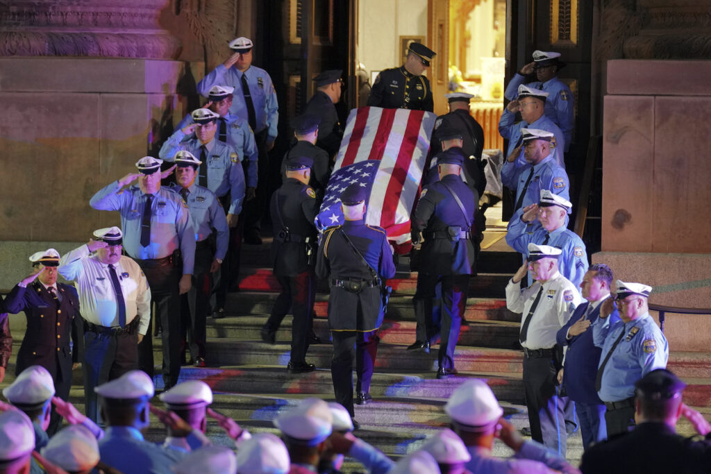 Funeral Service for Police Officer Richard Mendez Officers salute as the casket arrives at the Cathedral Basilica of Saints Peter & Paul in Philadelphia for the funeral service for slain Police Officer Richard Mendez, Tuesday Oct. 24, 2023.
