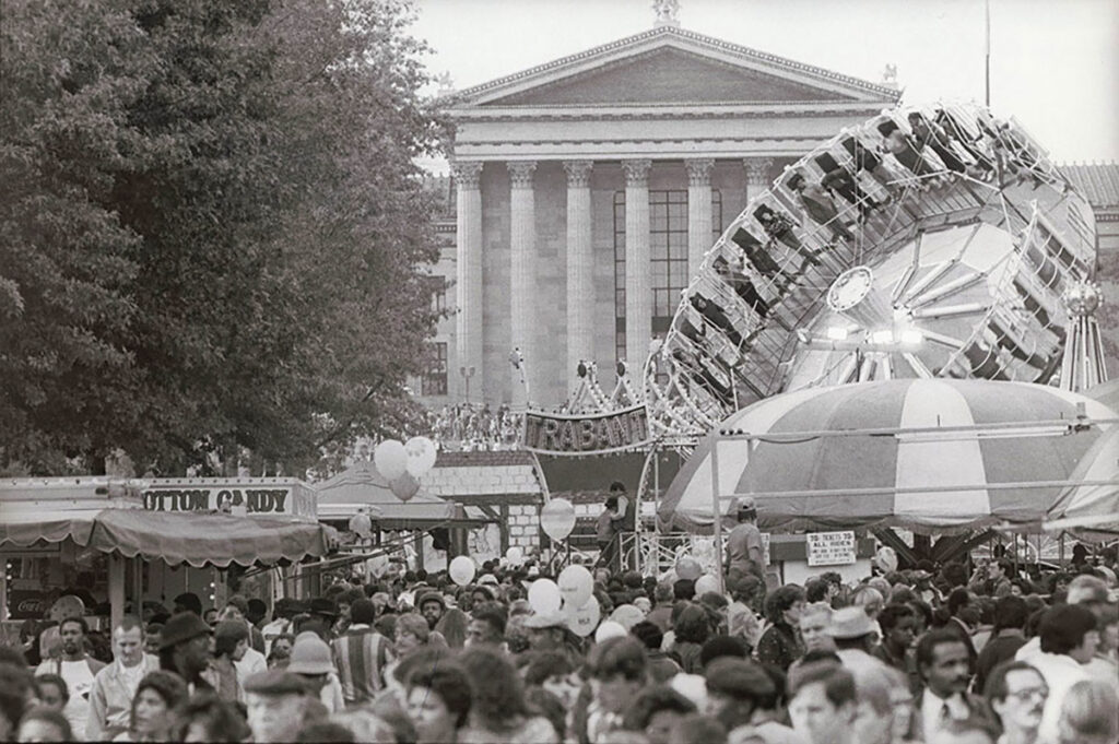 supersunday-benfranklinparkway-blockparty A black and white photo of a Super Sunday block party on Philly's Benjamin Franklin Parkway