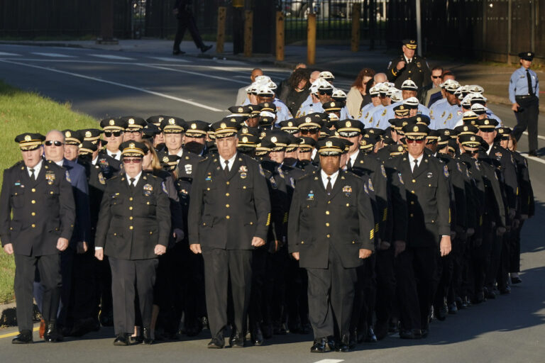The command staff of the Philadelphia Police Department marches to the viewing for slain Police Officer Richard Mendez, Monday Oct. 23, 2023, in Northeast Philadelphia.