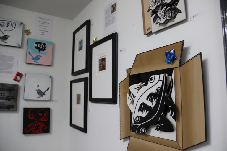 Works inspired by M.C. Escher's creations adorned the walls of the Front St. Gallery in Fishtown over the weekend. (Cory Sharber/WHYY)