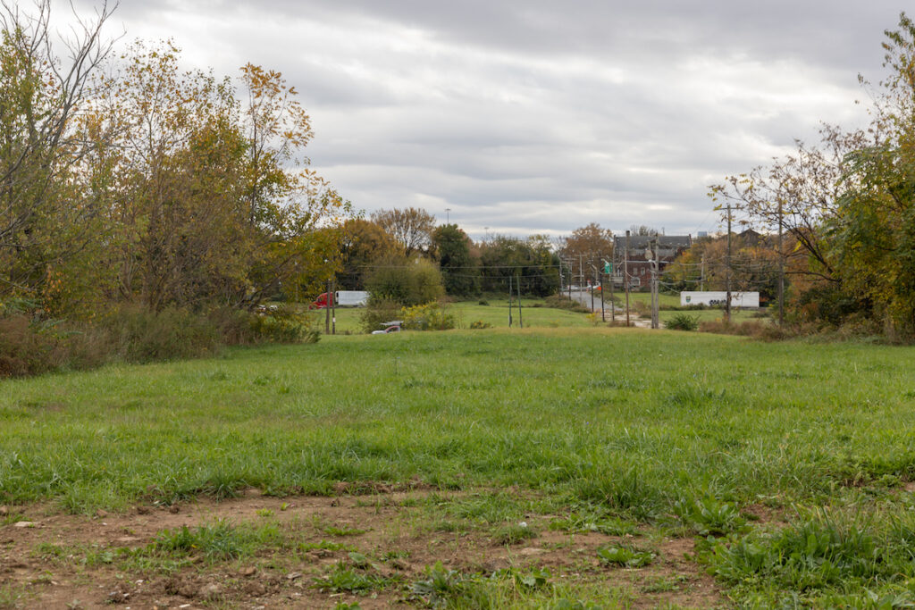 10 31 2023 k paynter logan triangle north philadelphia-4 an empty lot filled with grass
