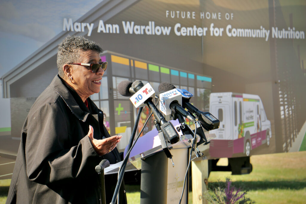 2022 11 06-e lee-mary ann wardlow-blackwell nj camden county-community nutrition center Ann Wardlow speaking at a podium