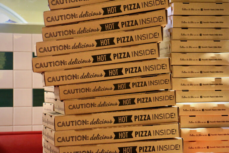 A stack of pizza boxes