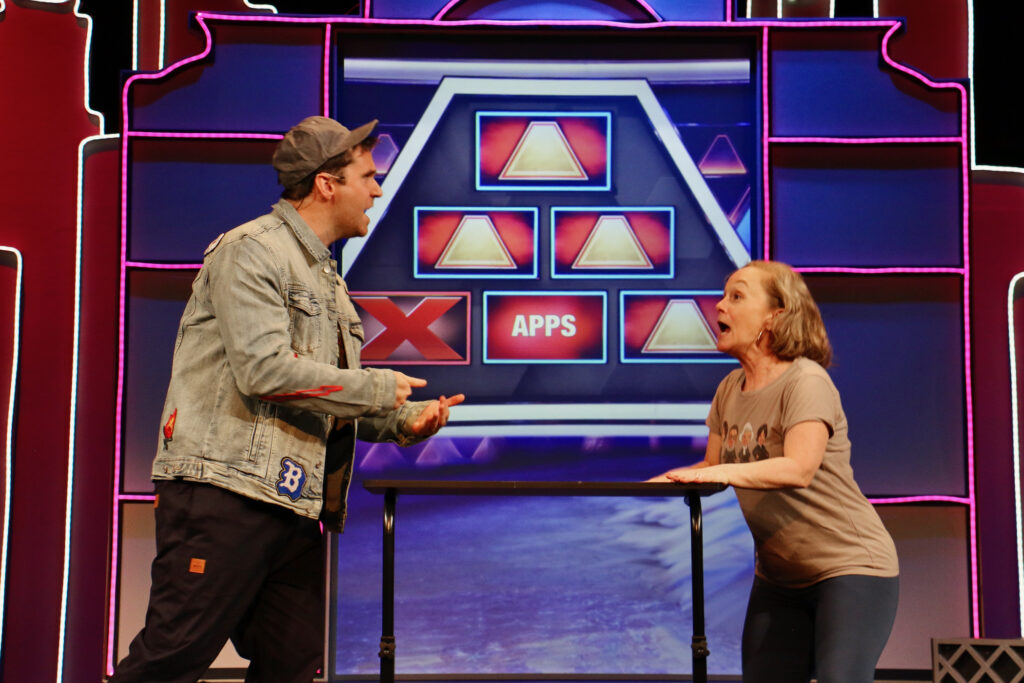 Jennifer Childs (right), cofounder and producing artistic director of 1812 Productions, rehearses a skit with Sean Close