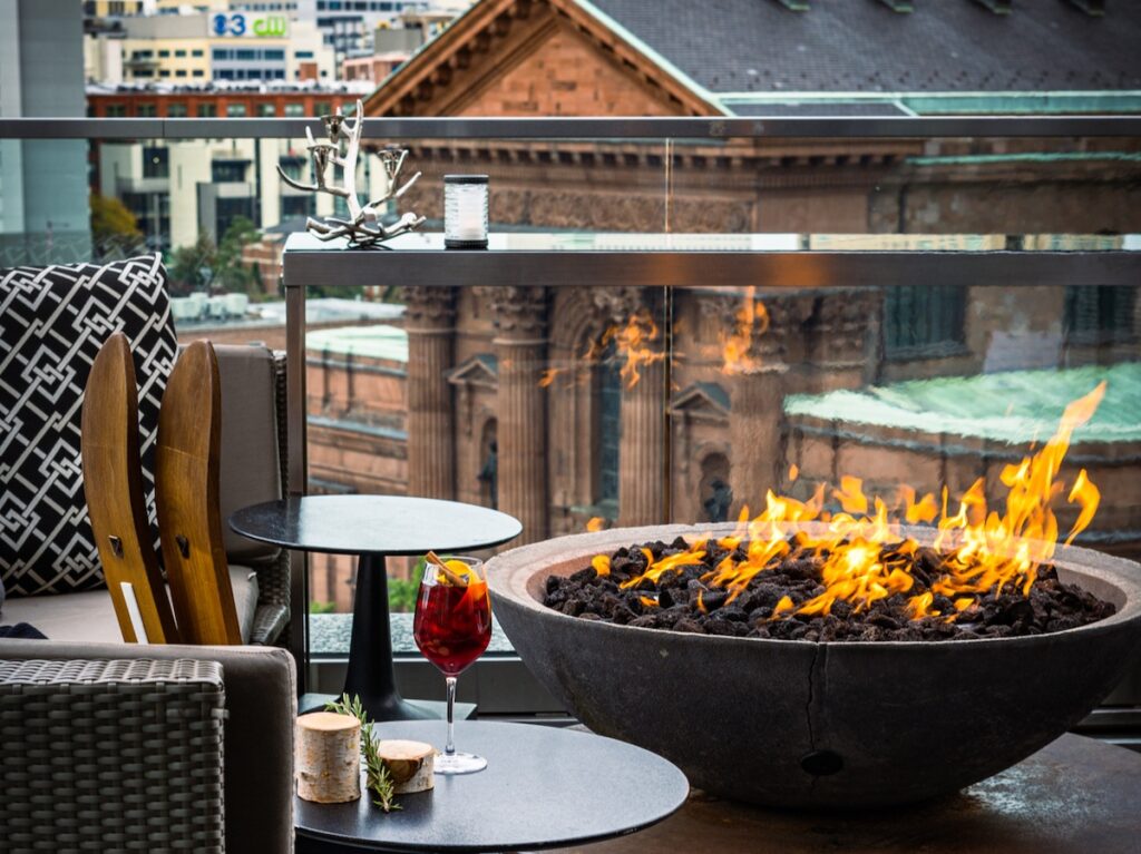 A fire bowl and more on an outdoor table