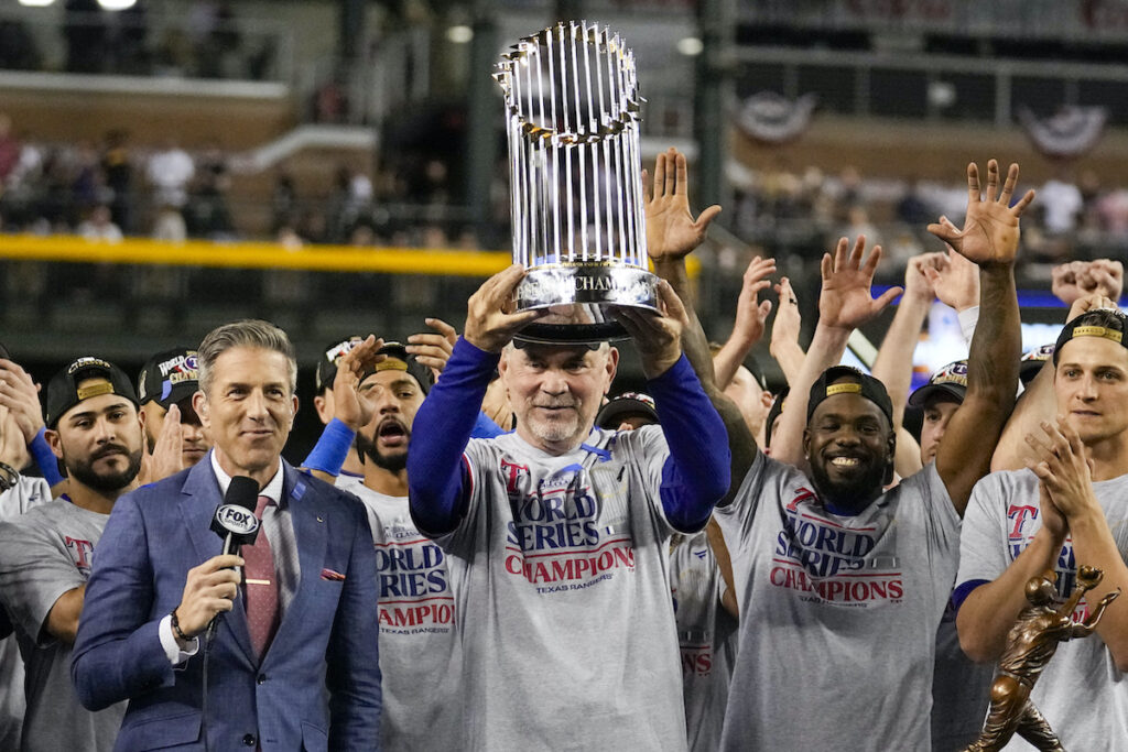 World Series Rangers Diamondbacks Baseball Texas Rangers manager Bruce Bochy holds up the trophy after Game 5 of the baseball World Series against the Arizona Diamondbacks Wednesday, Nov. 1, 2023, in Phoenix. The Rangers won 5-0 to win the series 4-1.