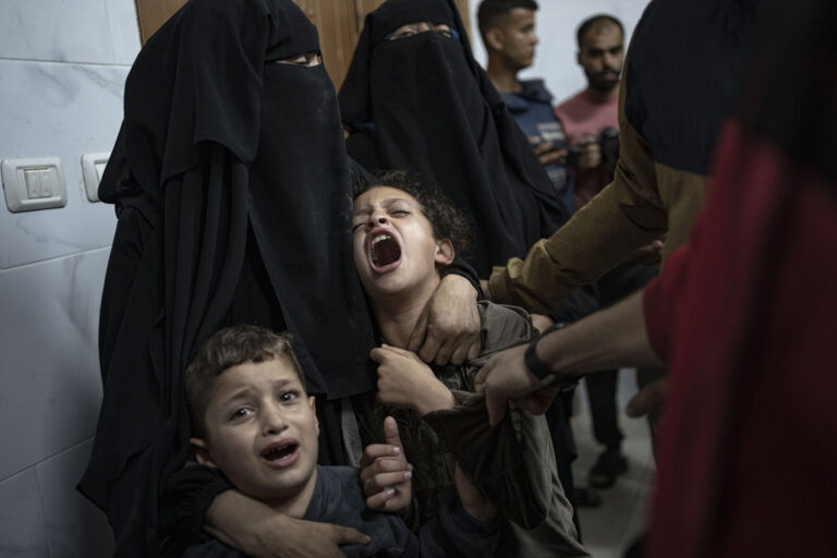 Palestinians mourn for relatives killed in Israeli bombardemnt of the Gaza Strip