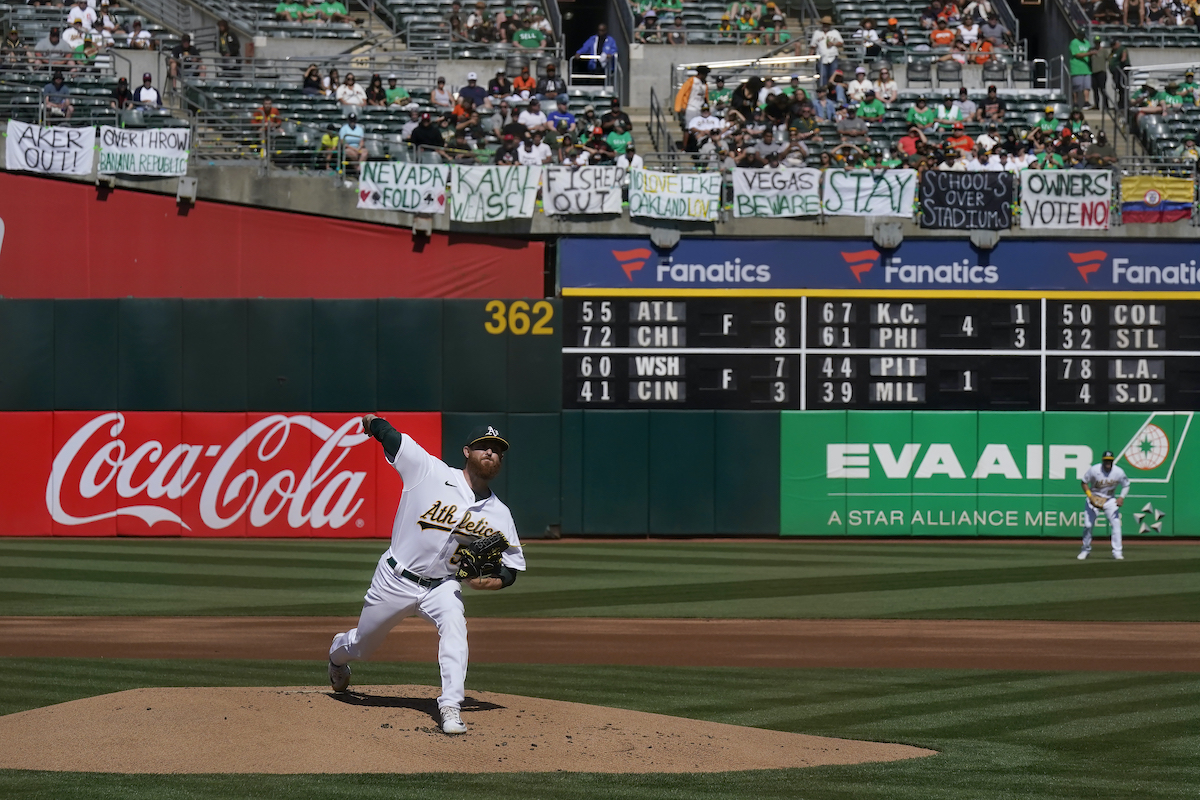 Paul Blackburn File photo: Oakland Athletics' Paul Blackburn pitches against the San Francisco Giants below signs hanging in right field protesting the team's potential move to Las Vegas and to call for management to sell the team during the first inning of a baseball game in Oakland, Calif., Saturday, Aug. 5, 2023.