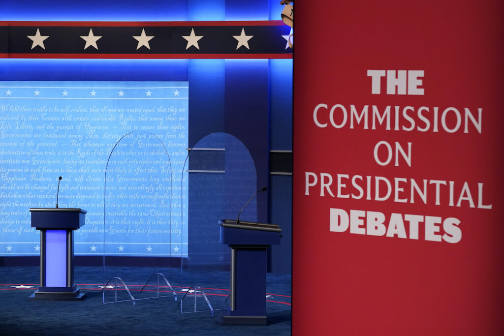 Election 2024 Presidential Debates File photo: Clear protective panels stand onstage between lecterns as preparations take place for the second Presidential debate at Belmont University, Oct. 21, 2020, in Nashville, Tenn.