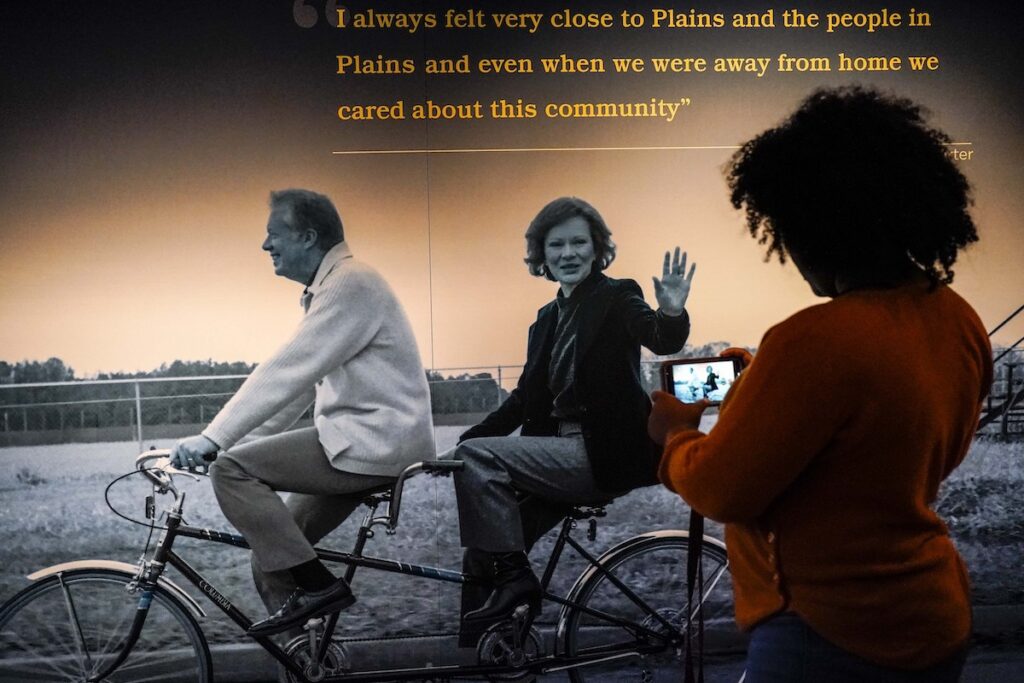 Rosalynn Carter Plains Brianna Cook, of Macon, Ga., looks at a display inside the Jimmy Carter National Historical Park, Monday, Nov. 20, 2023, in Plains, Ga. Rosalynn Carter, the closest adviser to Jimmy Carter during his one term as U.S. president and their four decades thereafter as global humanitarians, died Sunday, Nov. 19, 2023. She was 96.