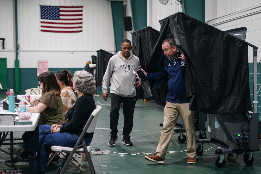 voters at the polling place on election day