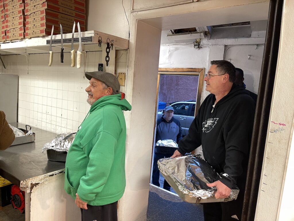 Joseph Conti waited in line to drop off his turkey