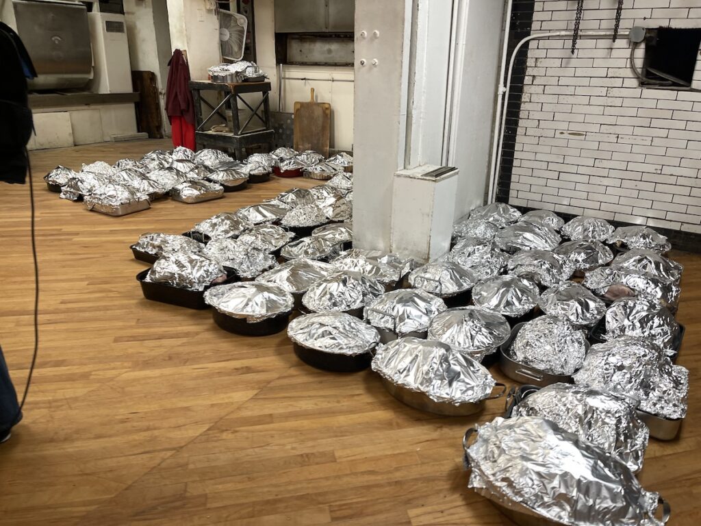Turkeys on floor, waiting to be cooked