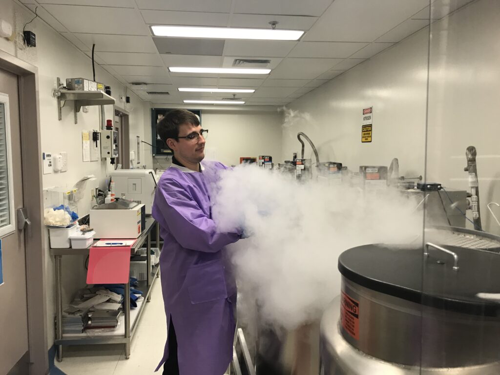 IMG_6500 A lab technician opens a freezer