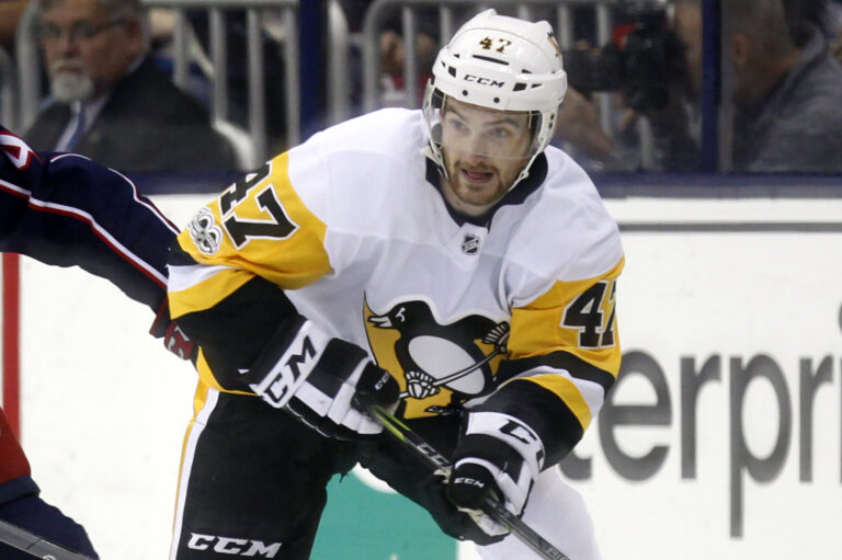 Former Pittsburgh Penguins forward Adam Johnson in action during an NHL game in Columbus, Ohio, in 2017. Police in England arrested a man Tuesday on suspicion of manslaughter in connection to Johnson's death in October.