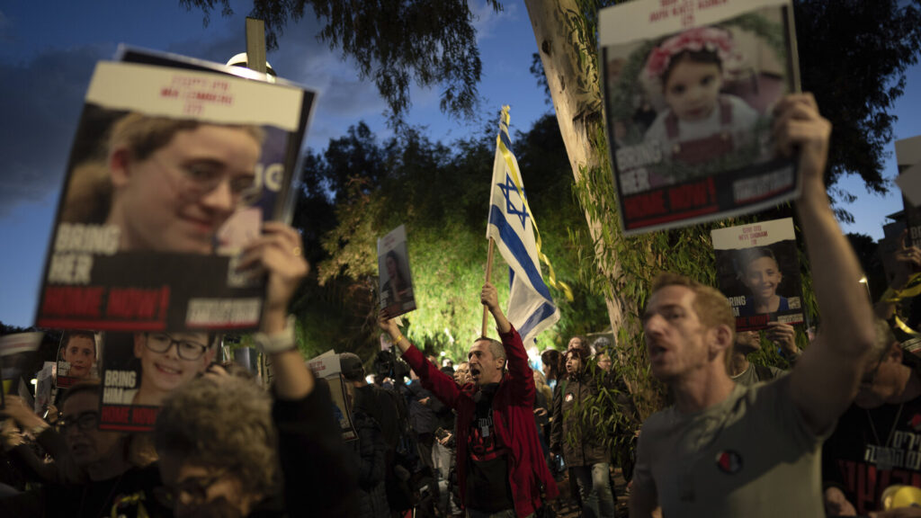 Israel Palestinians Demonstrators call for the return of 40 children who are among the roughly 240 hostages believed held by Hamas militants in the Gaza Strip as they mark World Children's Day during a protest across from UNICEF offices in Tel Aviv, Israel, on Monday. Oded Balilty/AP