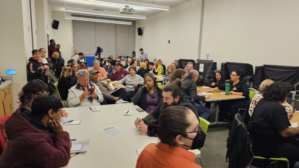 bridging-blocks-south-philly-e-marsh-2023-11-13-1 A group of people sitting at tables during the conversation.
