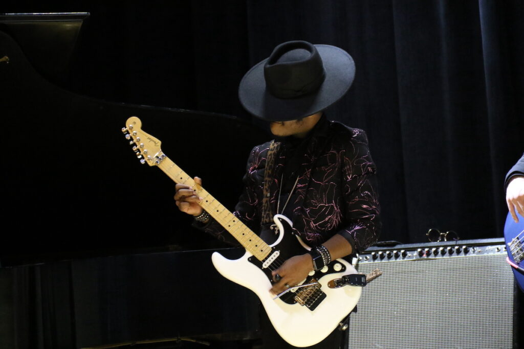 A student plays the guitar