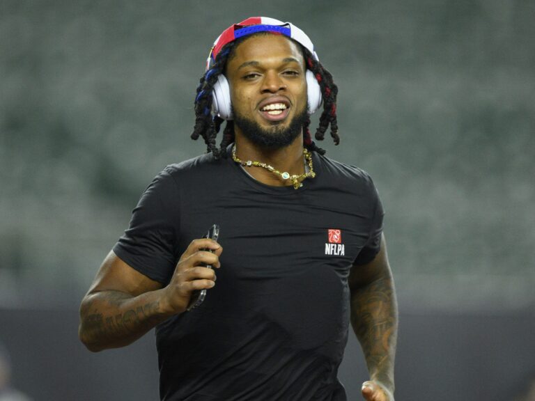 The Buffalo Bills' Damar Hamlin took 10 Cincinnati medical workers out for dinner — and told them he's setting up scholarships in their names. He's seen here before the Bills' game against the Cincinnati Bengals.