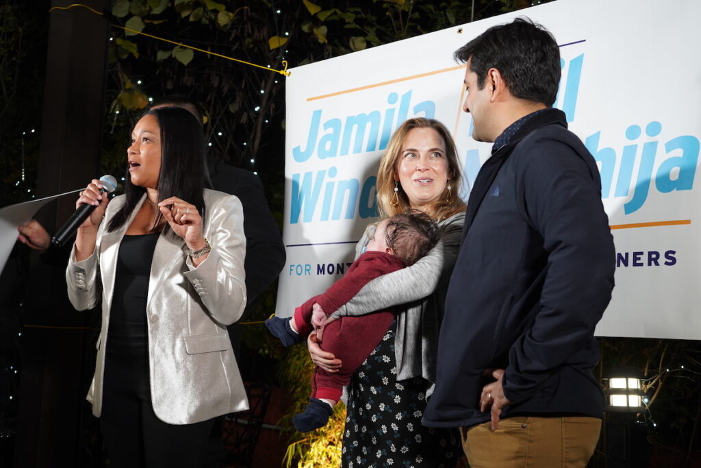 montco-commissioners-race-victory-2 Montgomery County Democrats Jamila Winder and Neil Makhija celebrate next to the podium with their families.