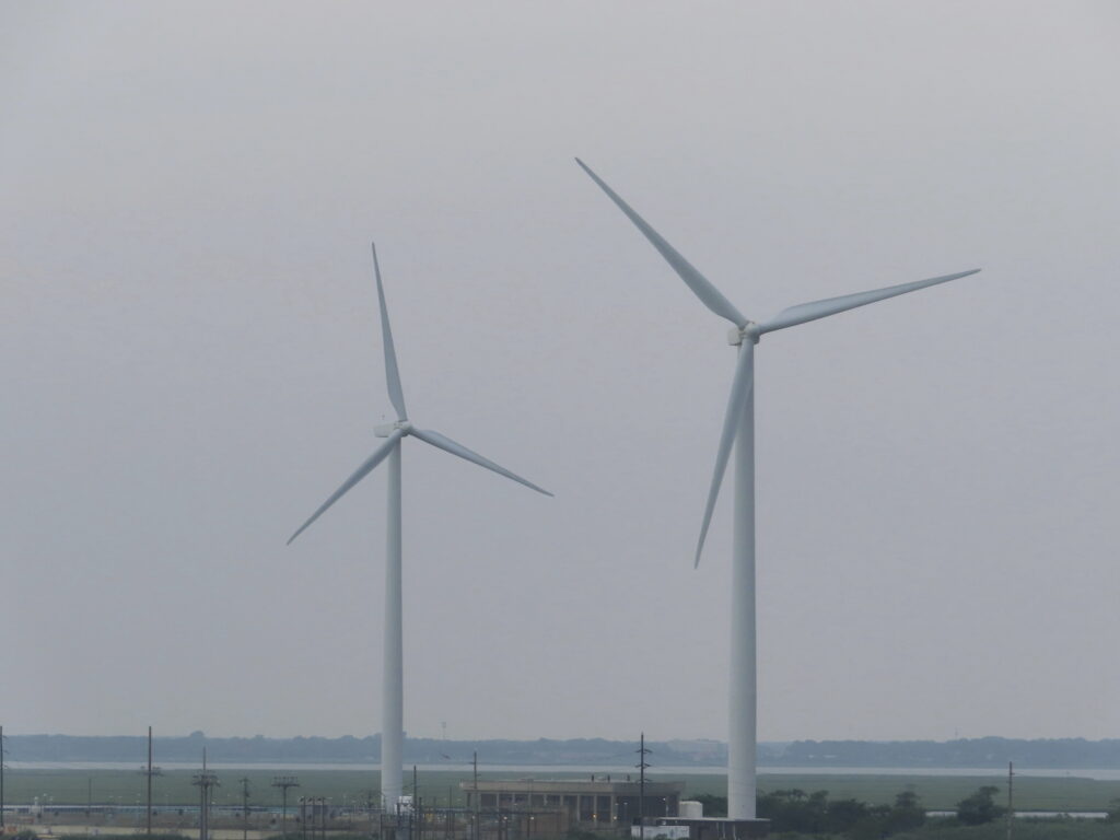 Offshore Wind-Distant Project Land-based wind turbines turn in Atlantic City