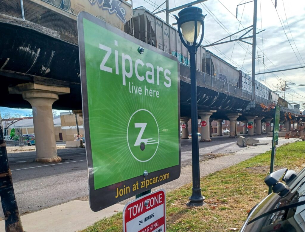 zipcar-pha-sign-scaled A sign at the dedicated Zipcar parking spot at Wilson Park Apartments, on the edge of Point Breeze.
