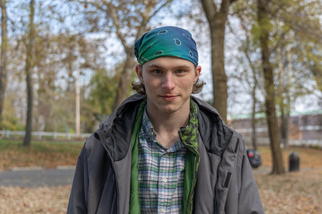 11 22 2023 k paynter colt pottstown schuylkill river area encampments_ A young man poses for a photo outdoors