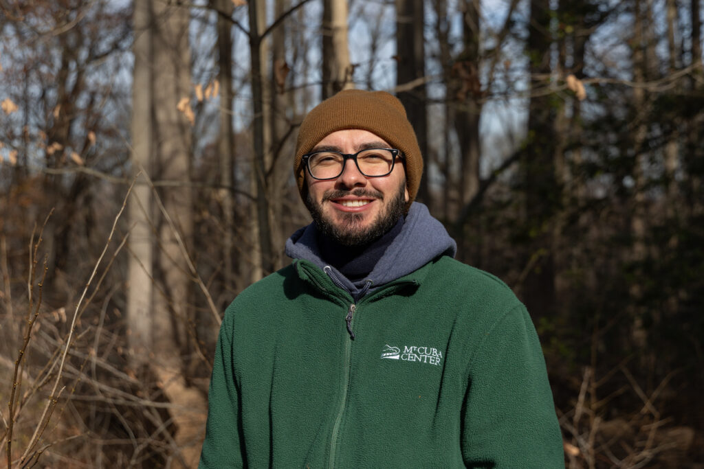 Josh Dunham, a senior horticulturist at the Mt. Cuba Center botanical garden in Hockessin, Del., is part of the meadow cleanup that delivers plant material and seed to Tri-State Bird Rescue and Research in Newark, Del. (Kimberly Paynter/WHYY)
