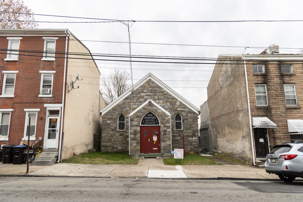 12 1 2023 k paynter norristown tibetan community center A former church is visible between rowhomes