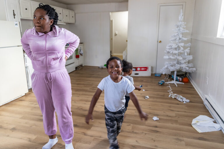 LaChenee Nelson, 24, with her children Legend, 2, and Logan, 5, in their apartment