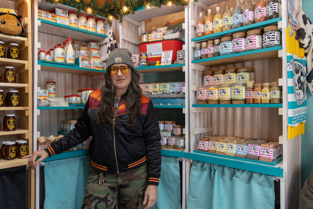 12 20 2023 k paynter sustainable gift giving center city-3 Melissa Lynn Torre, founder of the Vellum Street Soap Company, poses in front of shelves of soaps