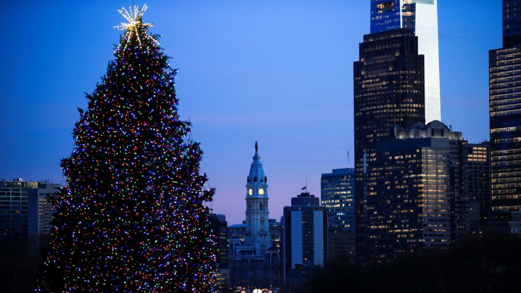 Pennsylvania Daily Life Christmas tree in front of Philly skyline