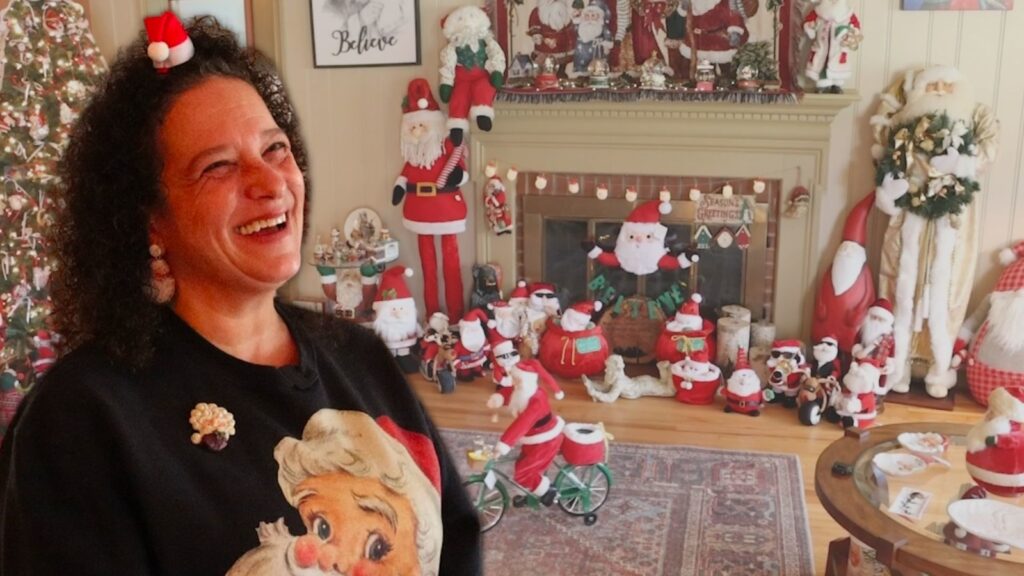 Trish D'Antonio at home with her Santa collection