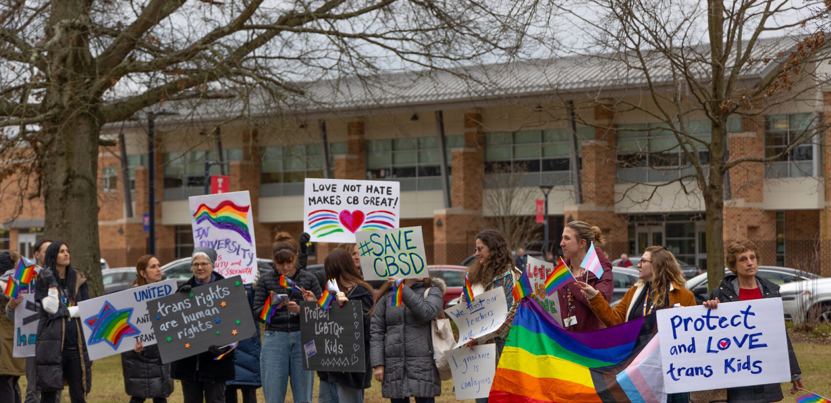 Pro-LGBTQ protest outside of a school.