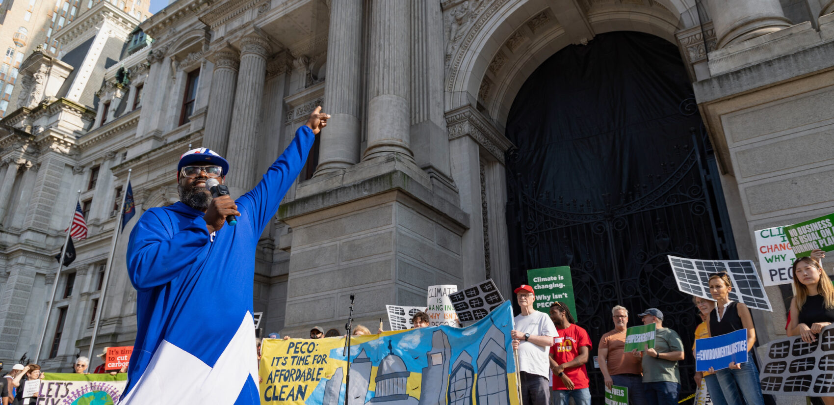 Shawmar Pitts speaking at a rally outside of City Hall