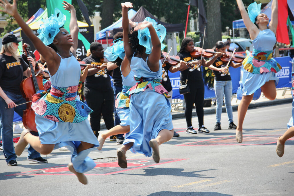 2023 09 18-c sharber-philadelphia-juneteenth Dancers and musicians on the street during a parade