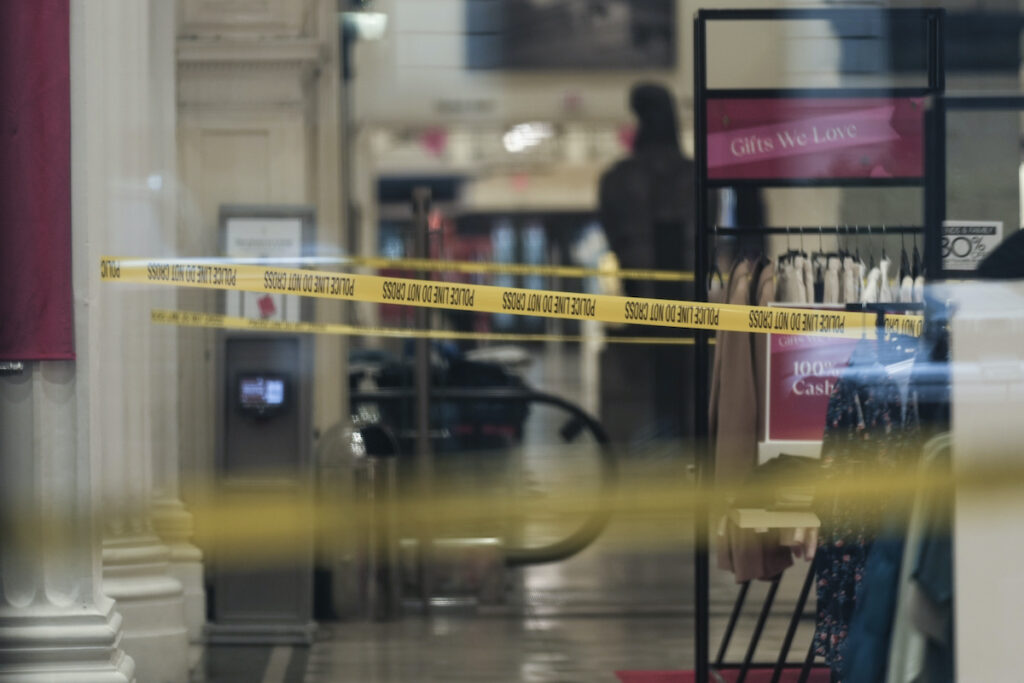 Fatal Department Store Stabbing Police tape is seen inside of a the Macy's retail location after reports of an alleged stabbing at the department store