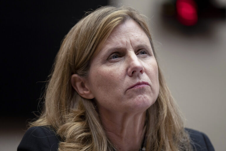 Liz Magill listening at a Congressional testimony
