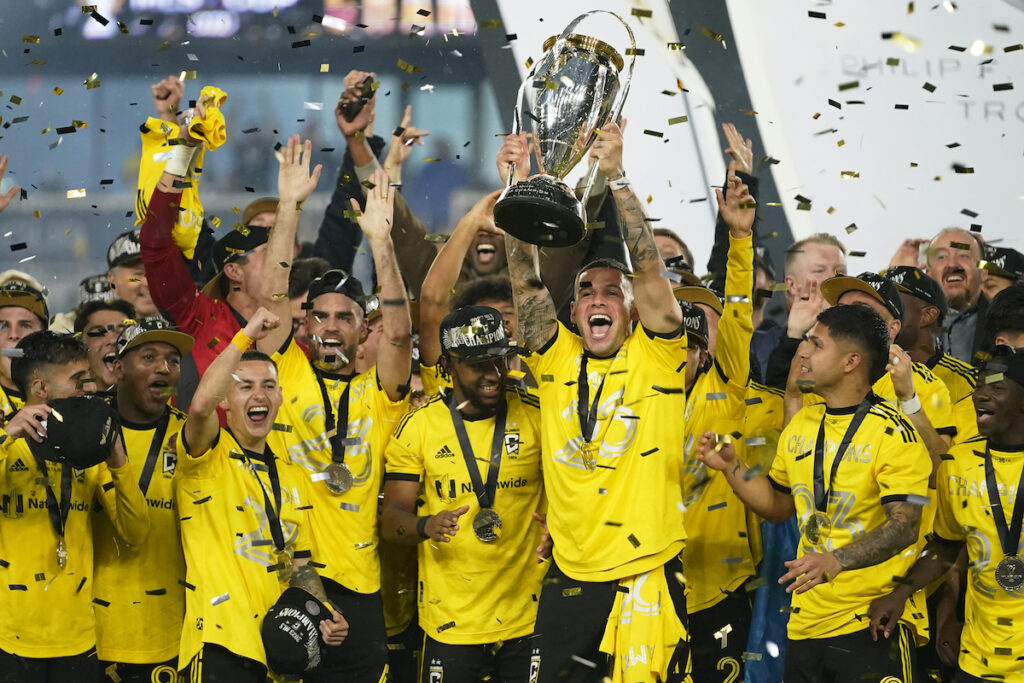 Christian Ramirez Columbus Crew players celebrate as Christian Ramírez holds up the trophy after defeating Los Angeles FC to win the MLS soccer championship match, Saturday, Dec. 9, 2023, in Columbus, Ohio.