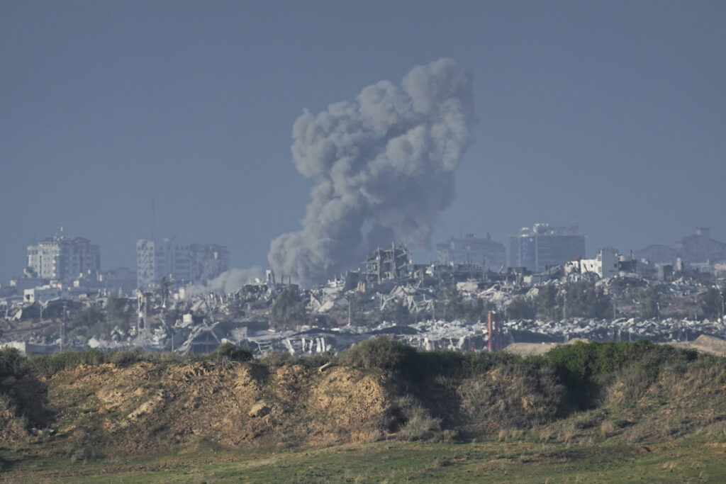 Israel Palestinians Smoke rises following an Israeli bombardment in the Gaza Strip, as seen from southern Israel, Sunday, Dec. 24, 2023. The army is battling Palestinian militants across Gaza in the war ignited by Hamas' Oct. 7 attack into Israel.