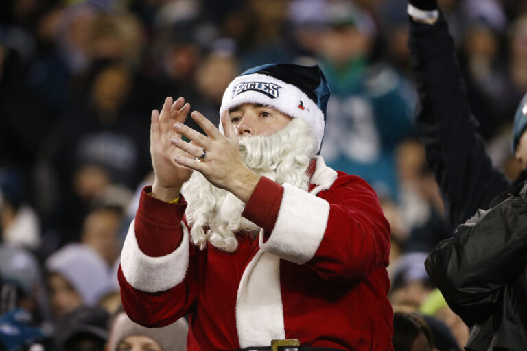 An Eagles fan dressed in Santa Claus outfit