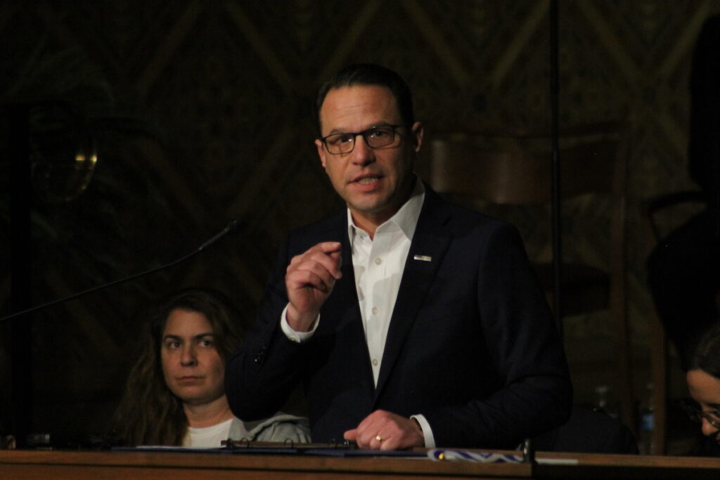 IMG_4326 Pa. Gov. Josh Shapiro addressed the hundreds in the pews of Congregation Rodeph Shalom on Dec. 10, 2023 for an ''Interfaith Rally Against Antisemitism.'' (Cory Sharber/WHYY)