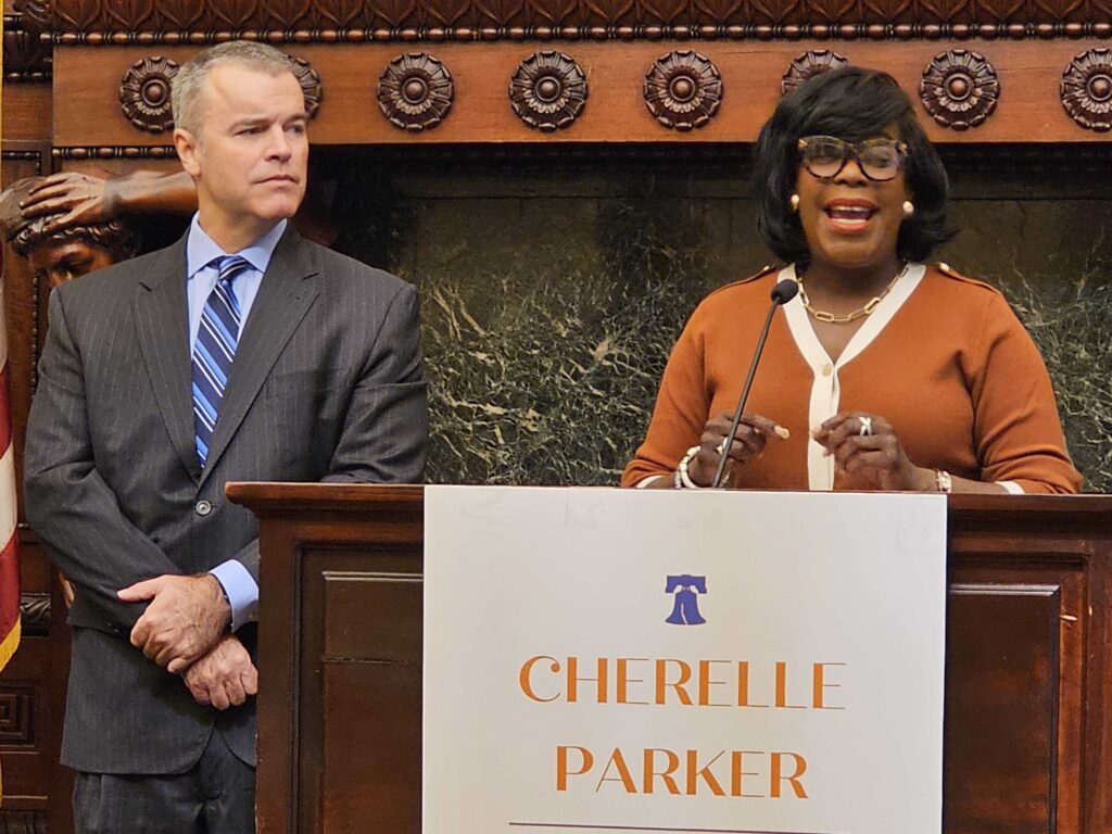adam-thiel-cherelle-parker-managing-director-TM-122623 Managing director designee Adam Thiel looks on as Mayor-elect Cherelle Parker announces his appointment.
