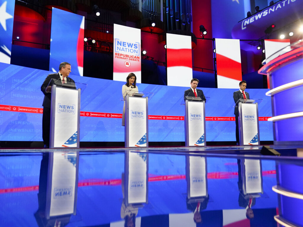 APTOPIX Election 2024 Debate Republican presidential candidates from left, former New Jersey Gov. Chris Christie, former U.N. Ambassador Nikki Haley, Florida Gov. Ron DeSantis, and businessman Vivek Ramaswamy during a Republican presidential primary debate hosted by NewsNation on Wednesday at the University of Alabama in Tuscaloosa, Ala. (Gerald Herbert/AP)