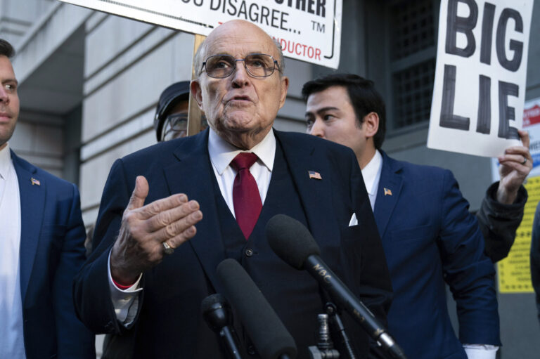 Former New York Mayor Rudy Giuliani speaks during a news conference after his defamation trial outside the federal courthouse in Washington, Friday, Dec. 15, 2023. A jury awarded $148 million in damages on Friday to two former Georgia election workers who sued Rudy Giuliani for defamation over lies he spread about them in 2020 that upended their lives with racist threats and harassment. (AP Photo/Jose Luis Magana)