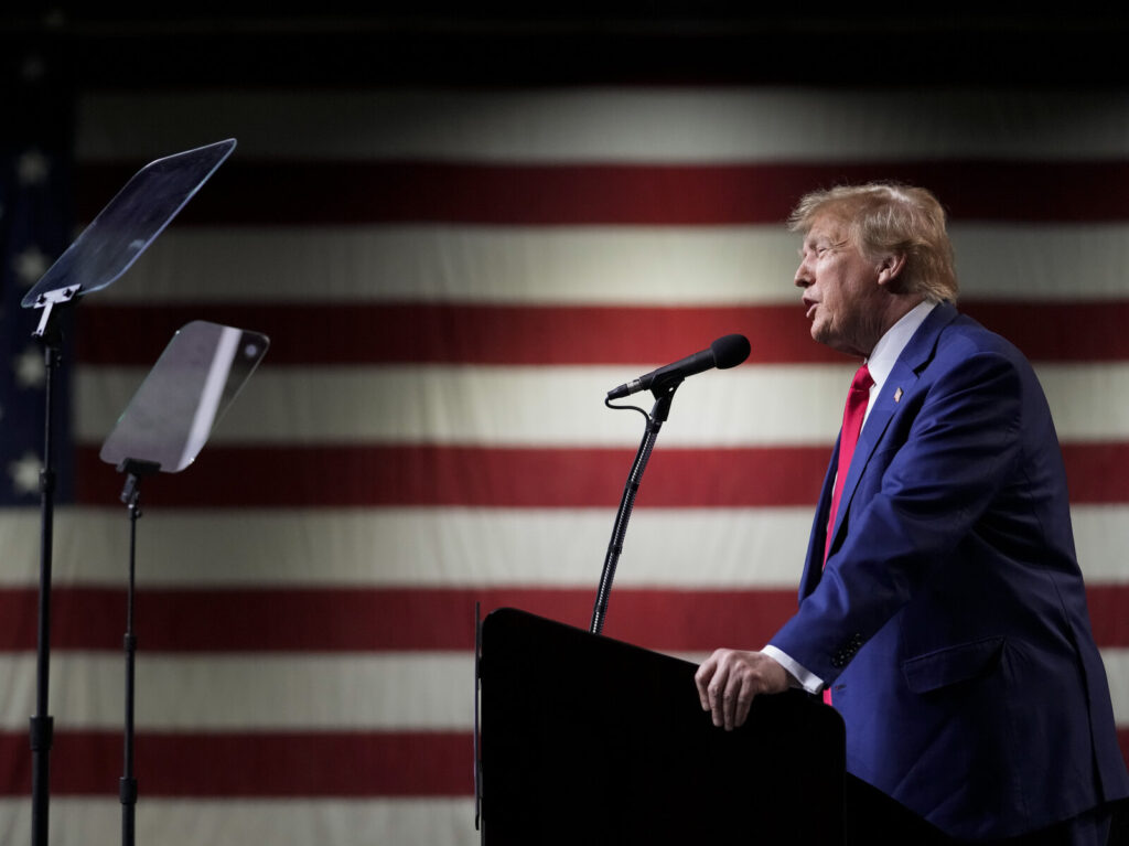Donald Trump Former President Donald Trump speaks during a rally Sunday, Dec. 17, 2023, in Reno, Nev. In a brief filed Saturday, Trump asked a federal appeals court to dismiss an election interference case against him, arguing he's immune from prosecution. (Godofredo A. Vásquez/AP)